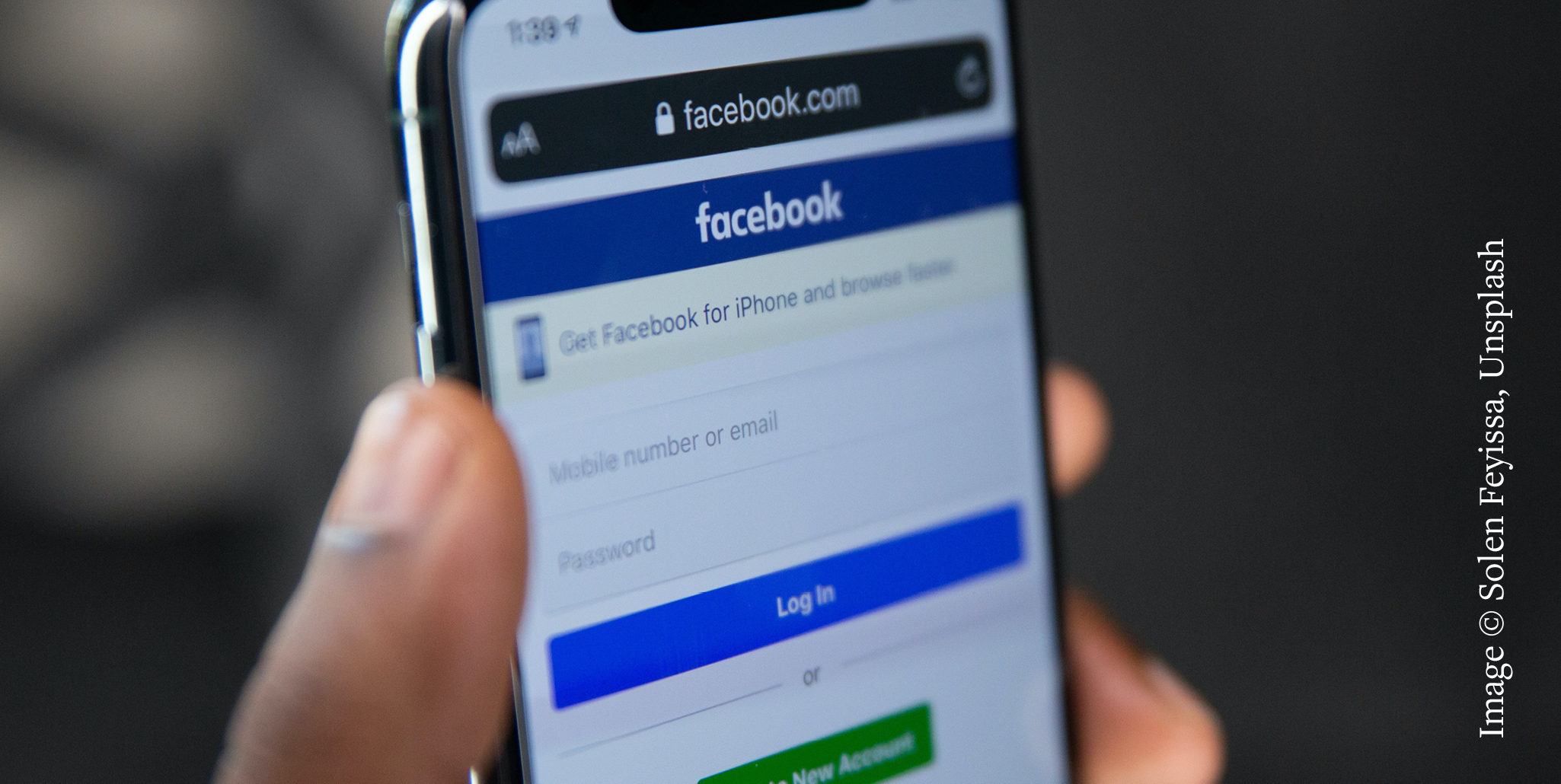A stock photo of a mobile screen showing the facebook login screen